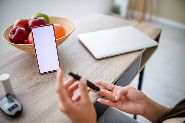 istock Monitoring health at home with technology in a modern living space during daylight hours 2217494688