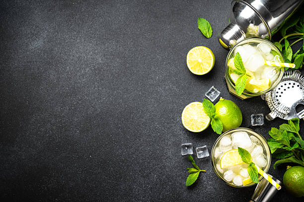 istock Mojito with rum and lime on black background. 2217496980