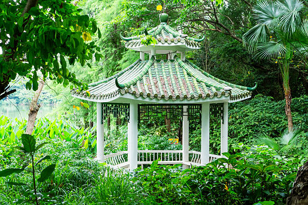 autumn forest scenery atmospheric October aesthetic environment landscaped park with wooden gazebo building and empty space for resting and walking action