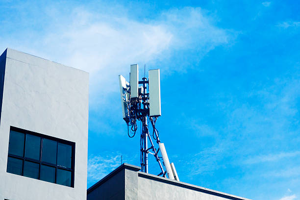 istock 5g antennas on rooftop of condominium 2217499292