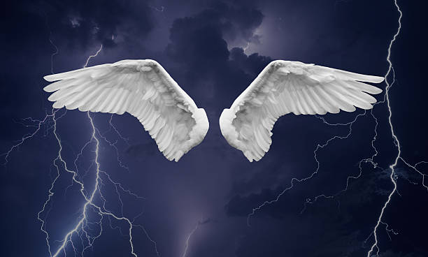 istock Angel wings against storm clouds 2217502053