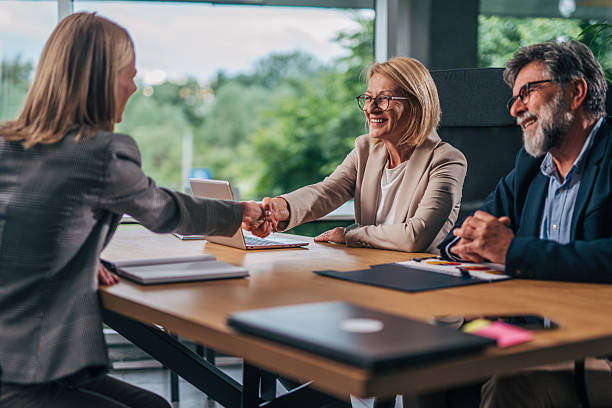 istock Businesswomen shaking hands after successful job interview 2217503485