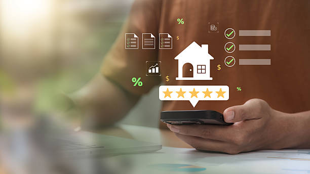 istock Real estate rating concept showing a user evaluating properties through a mobile app, highlighting housing investment, customer feedback, satisfaction, market analytics, and digital property reviews 2217503487