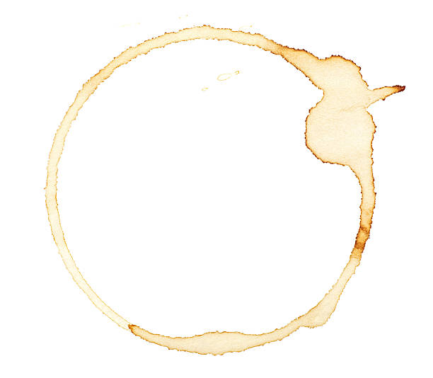 istock Coffee stain isolated on a white background, top view. Round stain isolated. Coffee and tea stain cup ring. 2217516947