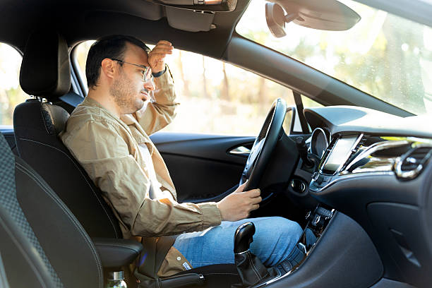 istock Stressed tourist suffering headache during road trip vacation 2217524727