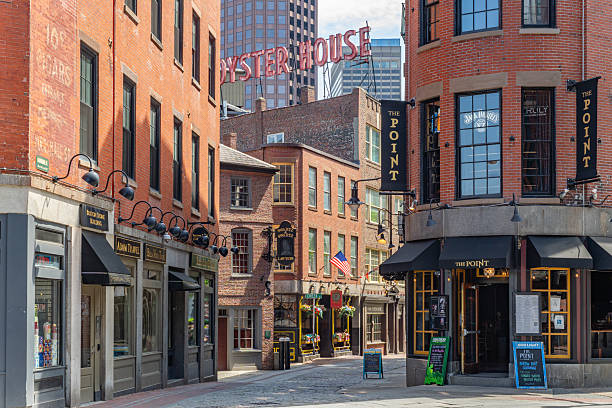 Boston, MA, US-April 16, 2025: Quain historic street in downtown district with Union Oyster House in background.