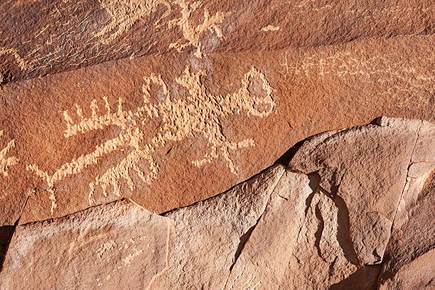 istock Native American petroglyph of a bird or an alien 2217526204