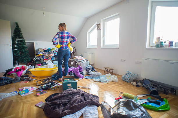istock Young woman cleaning the house 2217542537