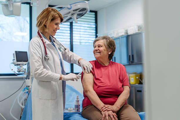 istock Elderly patient being vaccinated by doctor. 2217546843