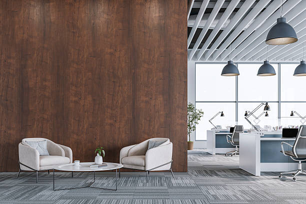 istock Modern Office Interior with Dark Wood Wall and Lounge Area with decoration 2217549454