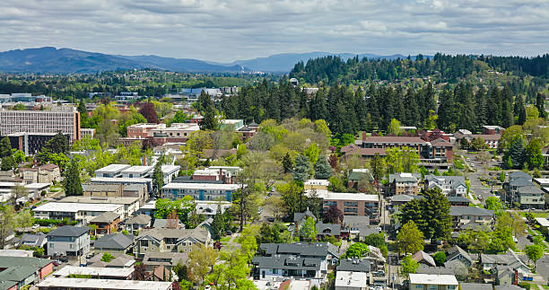 istock Treelined Streets in Eugene, OR with Forest and Mountains in Distance 2217558993
