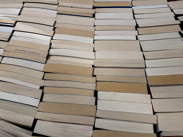 Books Stacked Neatly on a Table Background