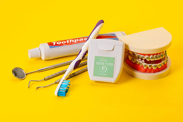 Braces from the Dentist on a Yellow Background