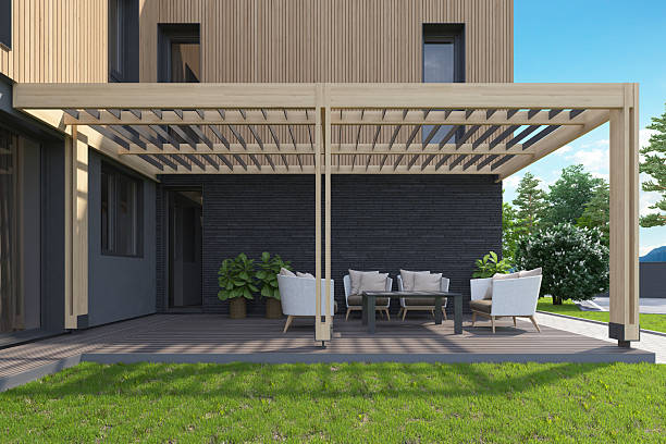 istock Modern Backyard Terrace with Canopy, Wood Decking, and Scandinavian Facade 2217568524