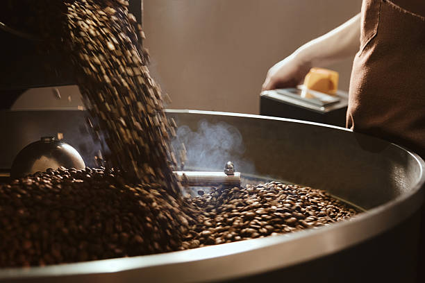 istock The Artisans in a Coffee Shop Engage in Coffee Roasting Process 2217582214
