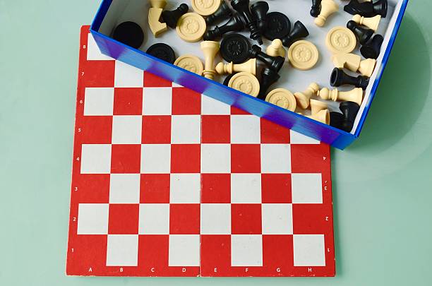 istock chess board with chess pieces ready for play isolated on white background chess game 2217582649