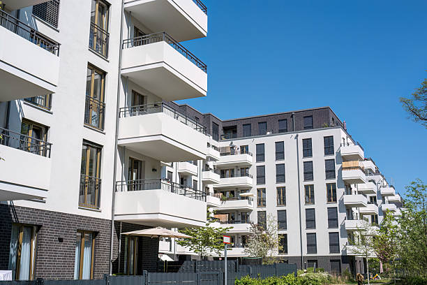 istock White multi-family residential buildings 2217583091