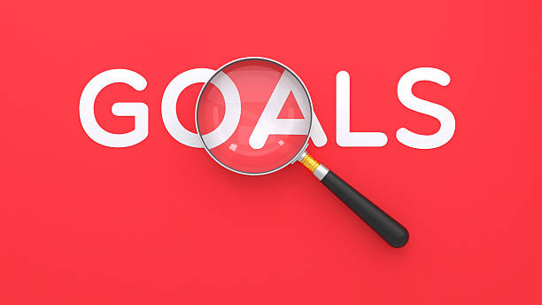 istock Focusing on Goals: Motivational Magnifying Glass 2217583608
