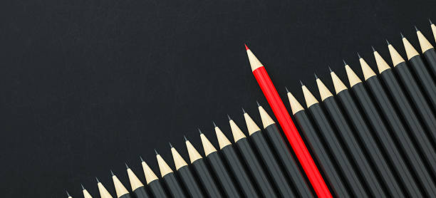 istock Individuality: Red Pencil Stands Out 2217585983