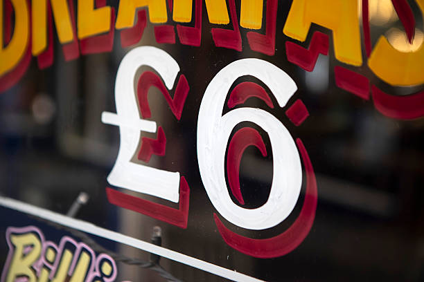 Hand painted sign on a shop window