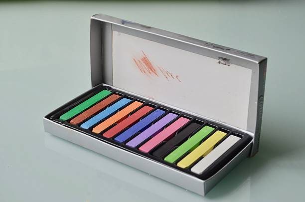 istock multicolored dry pastel crayons Pastels for drawing box with colored pencils 2217587976