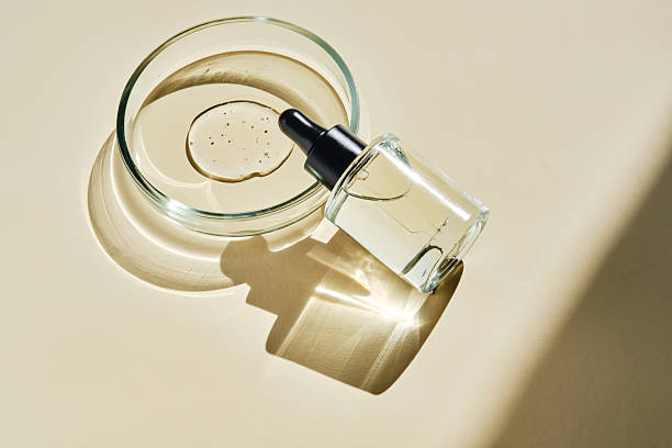 istock Oil essence for the face on a beige background. 2217588194