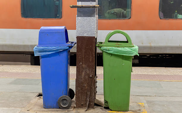 istock wet and dry dustbin kept at railway station with standing train background at evening 2217594397