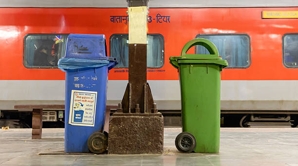 istock wet and dry dustbin kept at railway station with standing train background at evening 2217594455