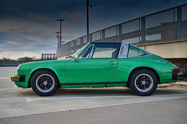 a porsche oldtimer in a green metalic color