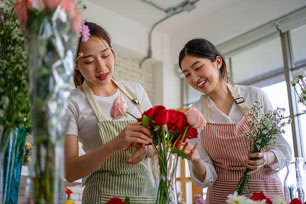 istock Young entrepreneurs are working at florist shop. 2217595033
