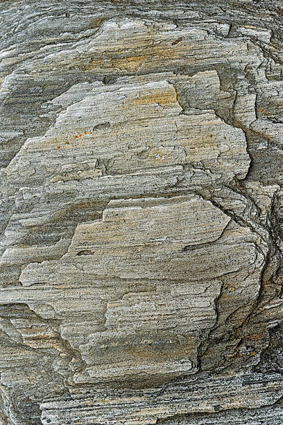 istock Textured gray stone surface showcasing natural patterns and geological formations in a rocky environment 2217603563