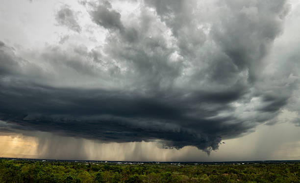 istock Storm clouds with the rain. Nature Environment Dark huge cloud sky black stormy cloud 2217603775