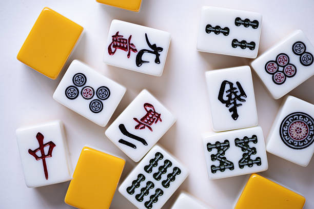 istock Mahjong tiles lined up on a white background 2217605408