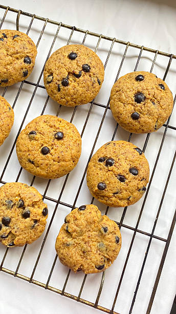 istock Chocolate chips cookies textured background isolated on white background, cookies with soft taste for snack. 2217606533