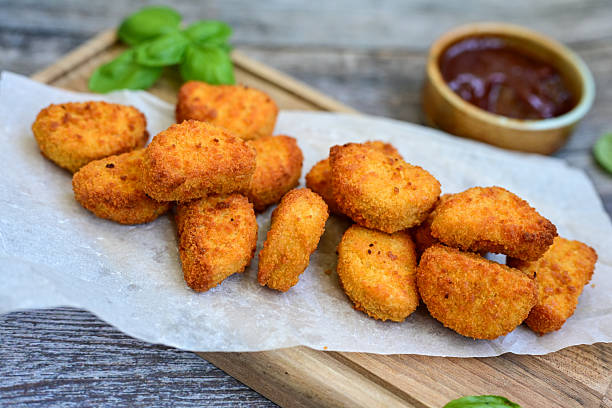 istock Crispy oven baked  chicken nuggets 2217608481