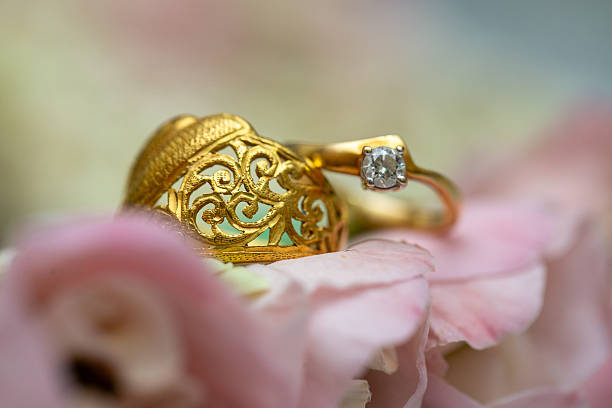Gold ring , Wedding ring,Diamond ring on the flowers.