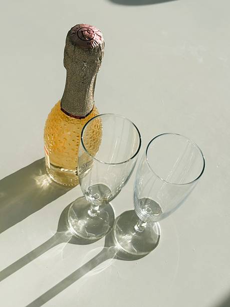 istock Small Bottle of Pink Champagne with Two Glasses 2217609451