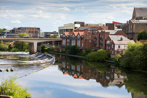 Buildings along the River Wear in Durham. Pictured is one of two weirs that impede the flow of the river