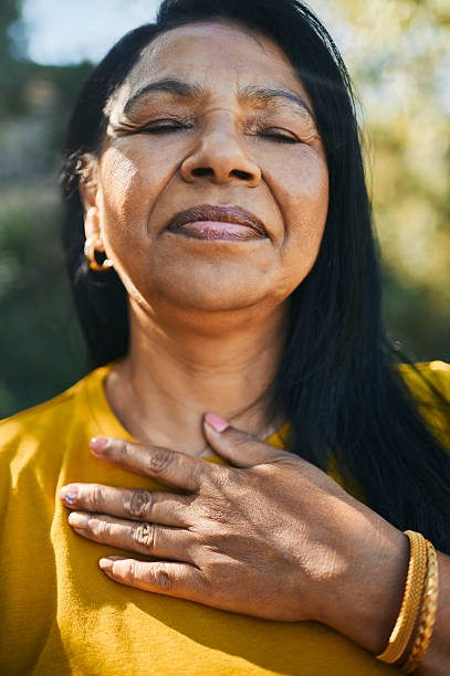 istock Serene Middle-Aged Woman Enjoying a Peaceful Moment 2217615729