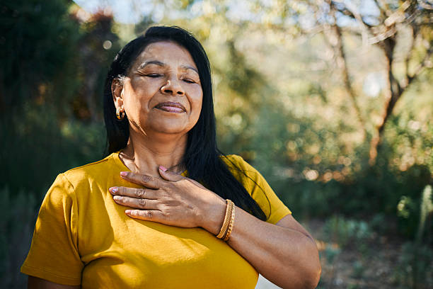 istock Serene Middle-Aged Woman Enjoying a Peaceful Moment 2217615735
