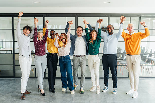 istock Diverse Team Celebrating Success Together 2217618075