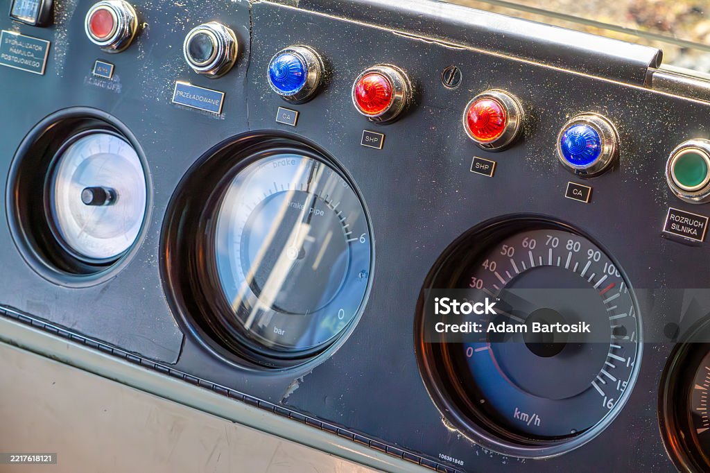 Control Panel Inside A Locomotive Cab Featuring Analog Gauges Including ...