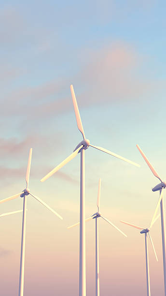 istock A vertical scene of modern wind turbines gently rotating at sunset in a realistic 3D rendering. Concept of sustainability, clean energy, and environmental awareness 2217618287