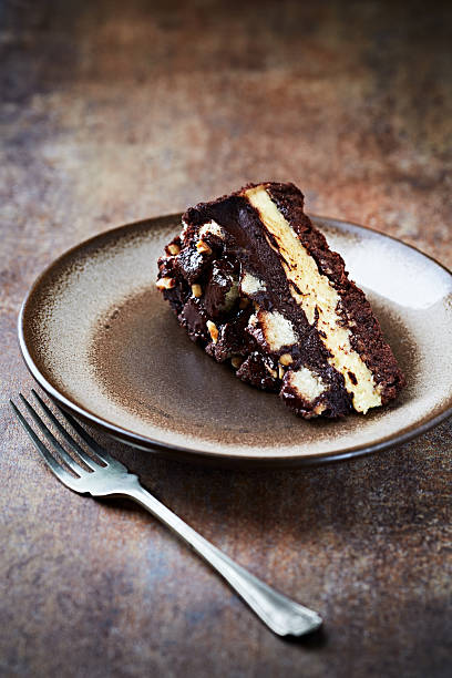istock Piece of Chocolate Cake on a Plate. Rustic stone background. Copy space. 2217621186