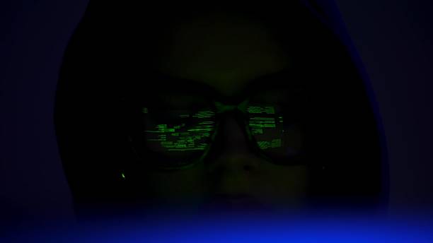 istock Mysterious Woman with Neon Light Reflection on Glasses 2217624348