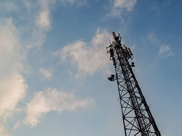 istock Telecommunication and internet tower isolated on blue sky background. 2217624405