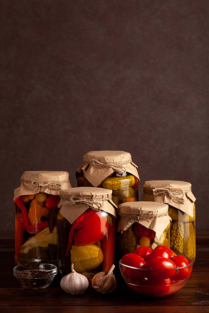 istock Rustic pickled vegetable variety in glass jars 2217624863