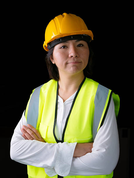 istock factory woman workers or technicians civil Engineer or Architecture project management standing with arms crossed. 2217626409
