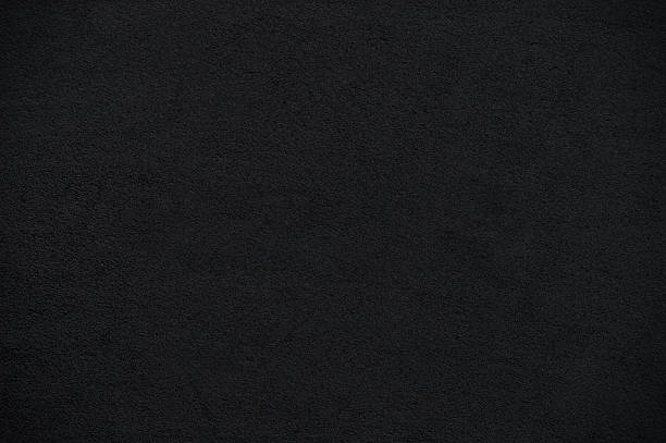 istock Textured effect empty blank plastered smudged wall or asphalt road abstract uneven old traditional style blackboard texture horizontal background in dark shiny black color 2217628447