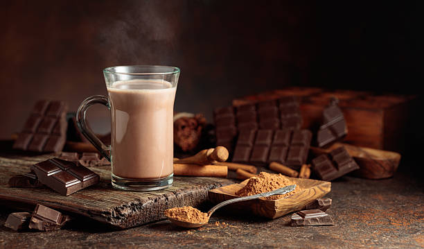 istock Creamy hot chocolate drink on a brown background. 2217630471